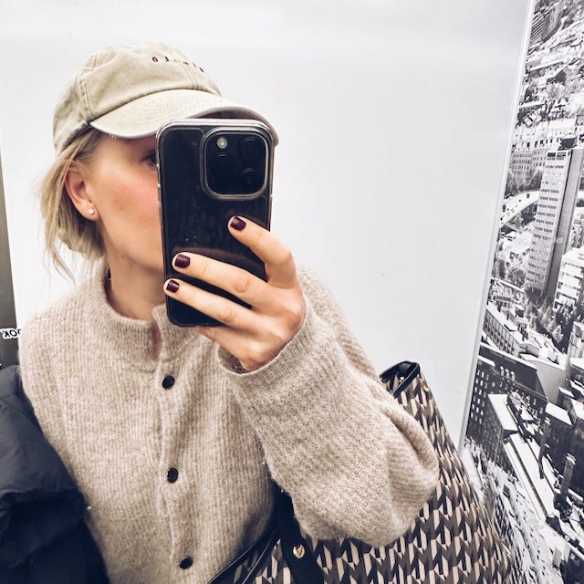 Luettua ja puettua logo