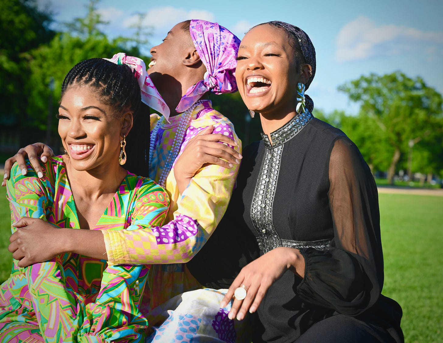 Group of 3 friends, laughing and enjoying themselves. National Mall, Washington, DC USA. Group of 3 friends, laughing and enjoying themselves. National Mall, Washington, DC USA.