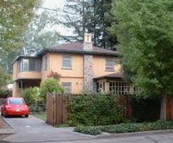 A house with a red car parked in front of it

AI-generated content may be incorrect.
