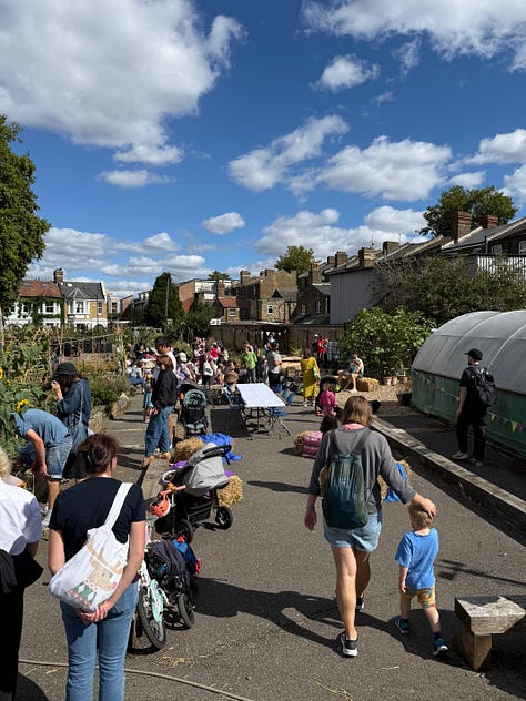 Images of the Leyton Boundary garden sign and pavilion decked in bunting, and the visiting crowds at the community garden.