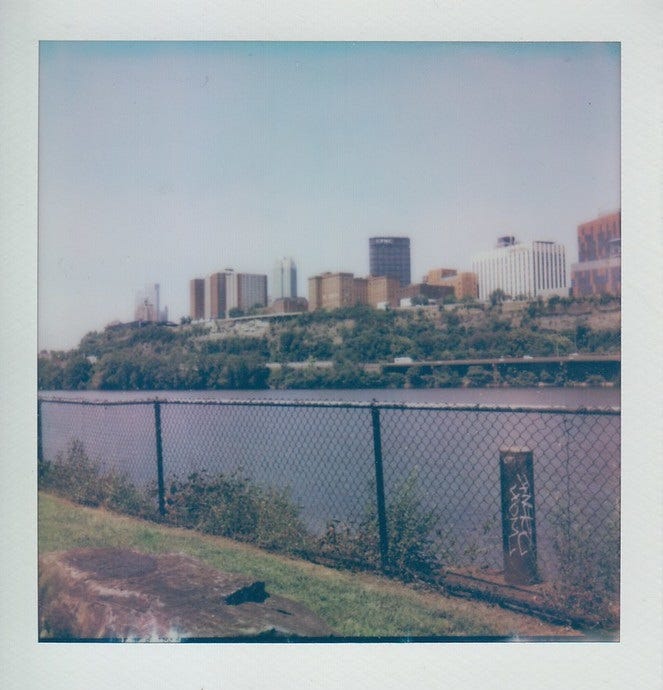 Polaroid of Downtown from the riverfront trail at South Shore Park.