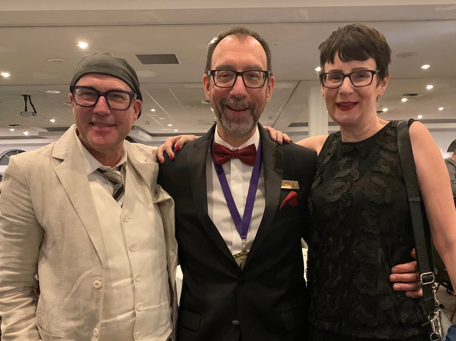 May be an image of 3 people and eyeglasses May be an image of 3 people and eyeglasses