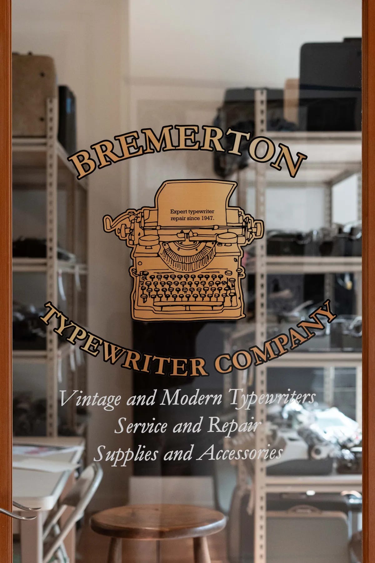 A sign advertising Bremerton Typewriter Company.