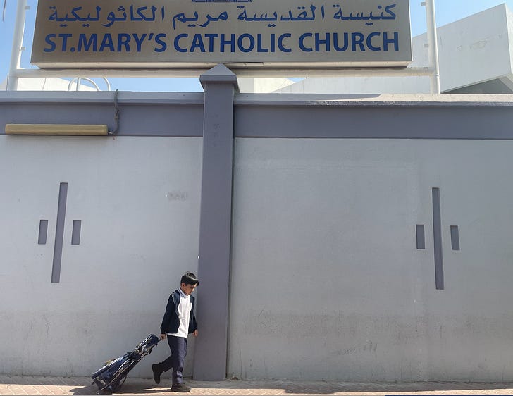 A student leaves St. Mary's Catholic School, Dubai. Credit: JD Flynn/Pillar Media.