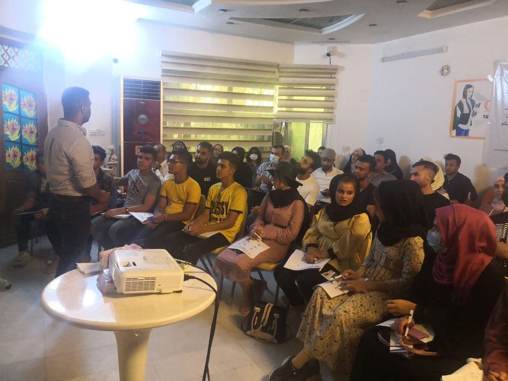 Talking in front of the audience at the first critical thinking workshop in my hometown Talking in front of the audience at the first critical thinking workshop in my hometown