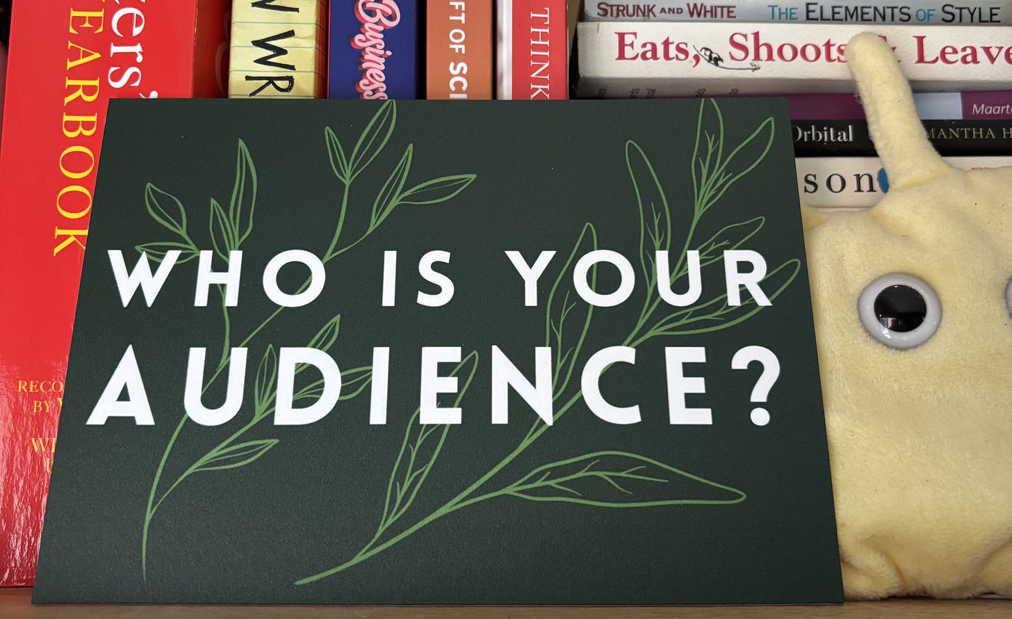 A bookshelf with a sign that says "who is your audience?"