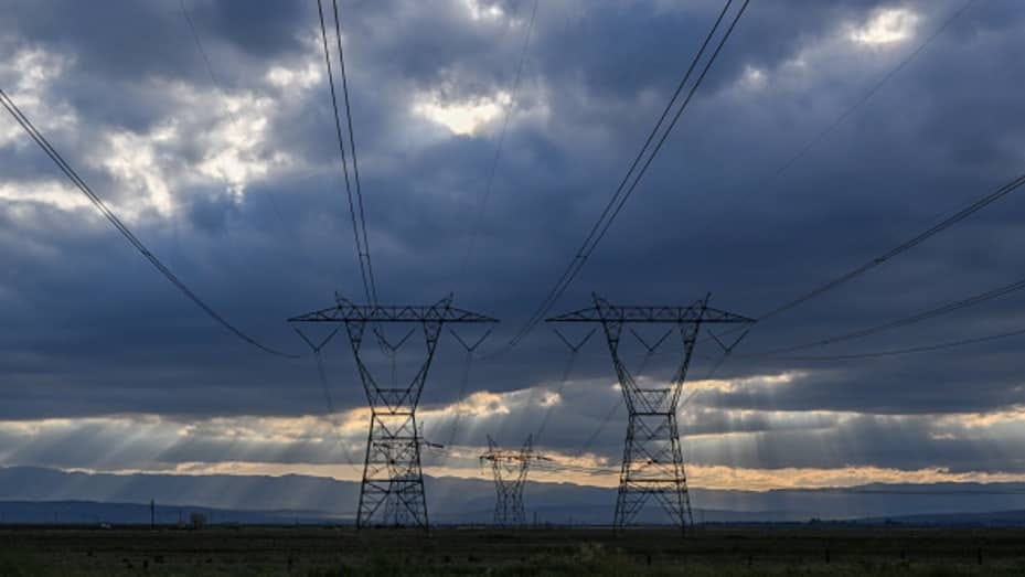 Huge clouds and transmission towers are seen from Highway 5 in Kern County of California, United States on April 2, 2023.