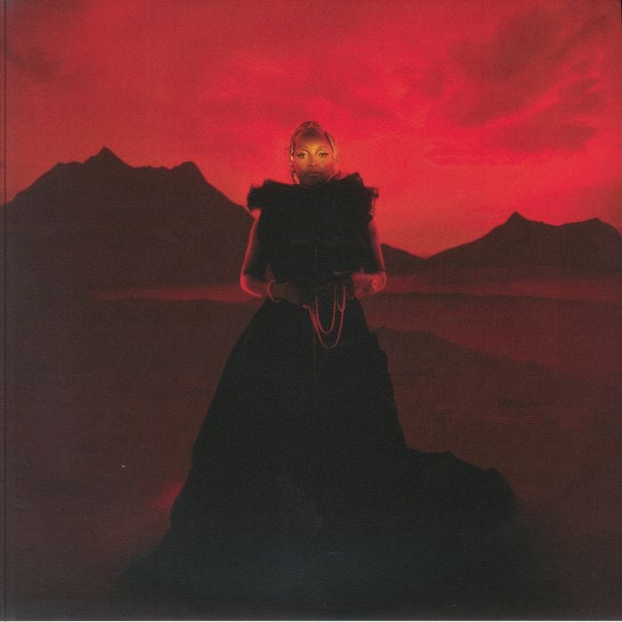 The cover of Nubya Garcia's album, Odyssey, showing the musician against red hills and a black sky
