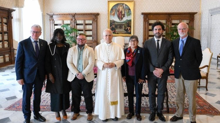 Pope Leo with members of the Eca Global board of directors
