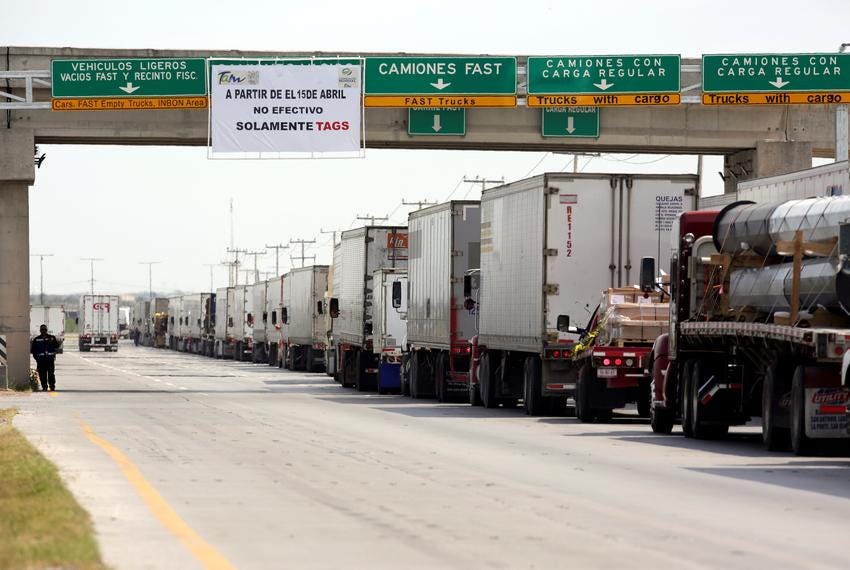 Trucks wait in a long queue for border customs control to cross into U.S. at the World Trade Bridge in Nuevo Laredo, Mexico April 2, 2019. Trucks wait in a long queue for border customs control to cross into U.S. at the World Trade Bridge in Nuevo Laredo, Mexico April 2, 2019.