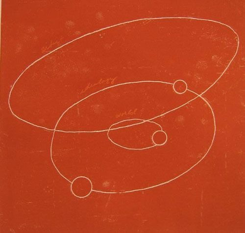 This may contain: an orange book with white lines on the cover and two circles in the middle, against a red background