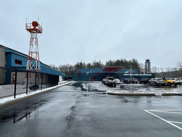 snow, trees, parking lot, cars, signs