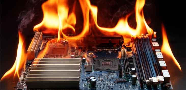 A fake AI-generated photo of a motherboard on fire.