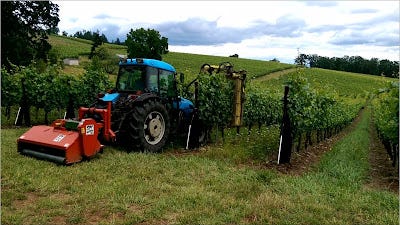 Click on the image to watch Ernie in action, hedging and mowing Click on the image to watch Ernie in action, hedging and mowing