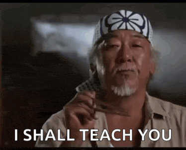 a man with a bandana on his head is holding a pair of scissors and says i shall teach you