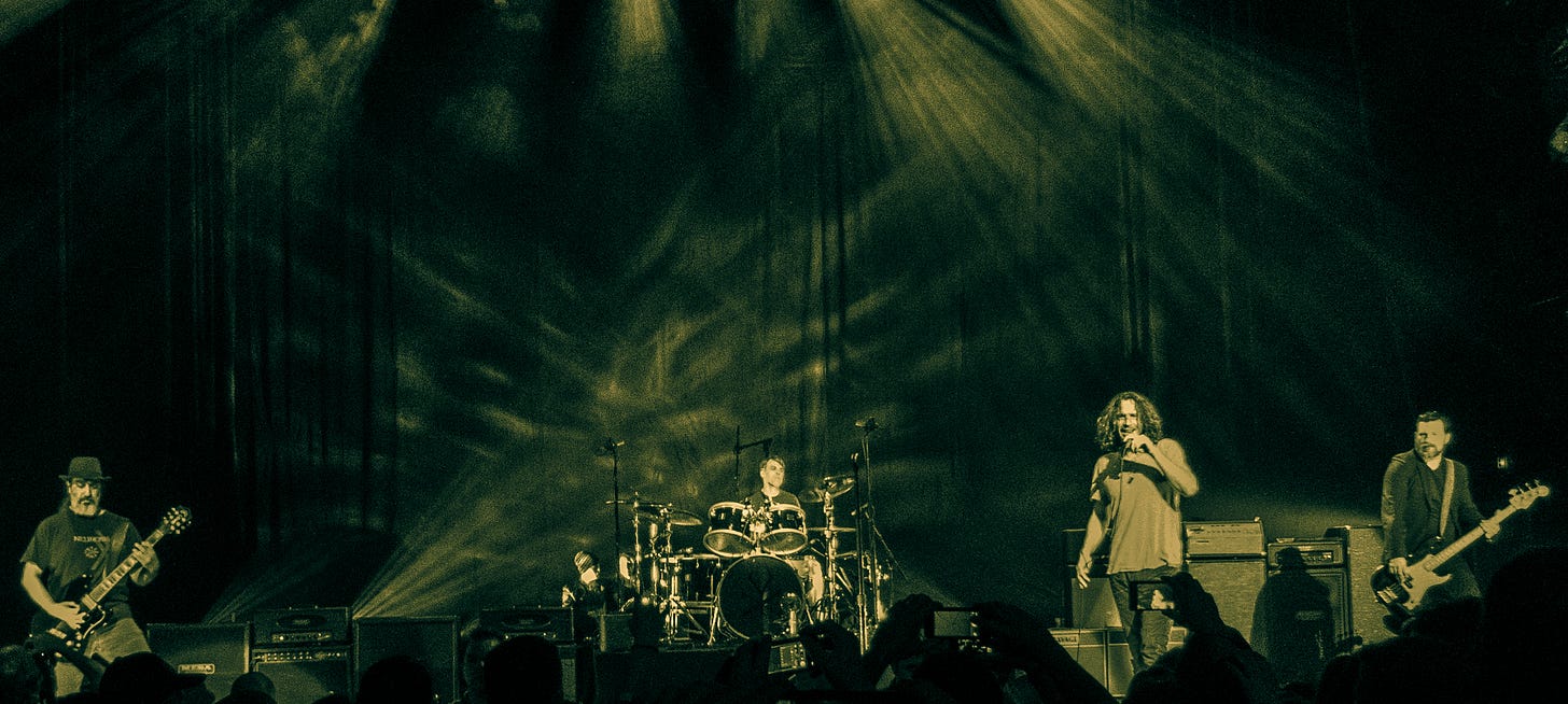 Soundgarden performing in February 2013. From left to right: Kim Thayil, Matt Cameron, Chris Cornell and Ben Shepherd.