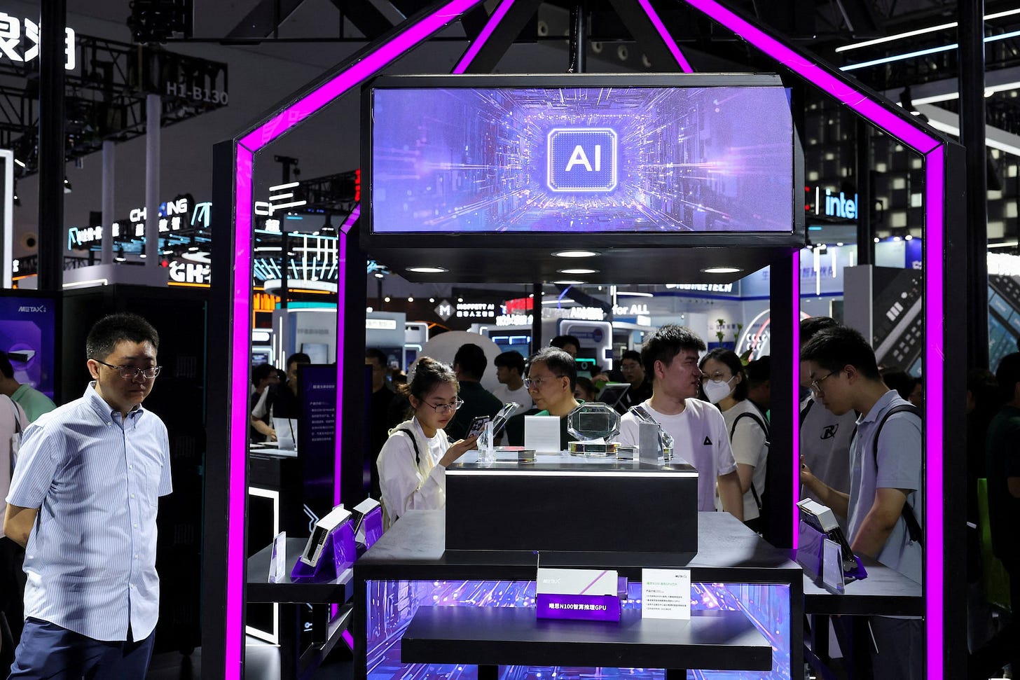 People visit Metax booth during WAIC in Shanghai