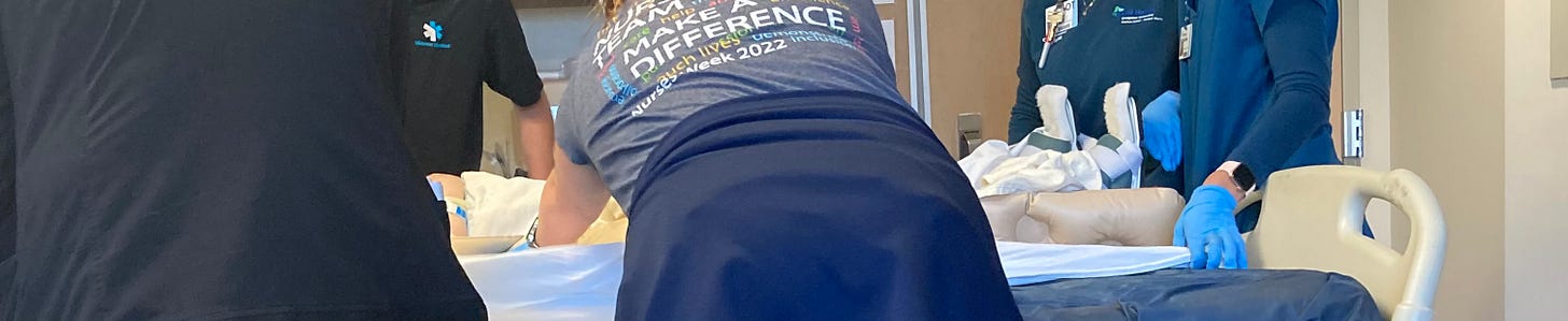 Cropped photo showing medical workers providing care for Debbie