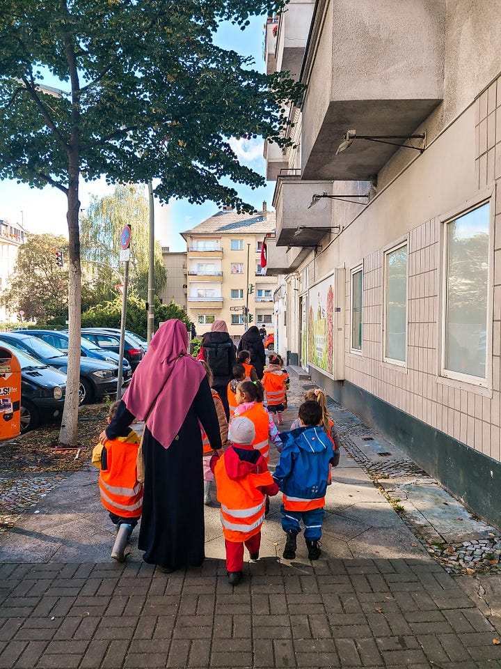 streets of Neukölln featuring herds of little kids and a thumbprint cookie