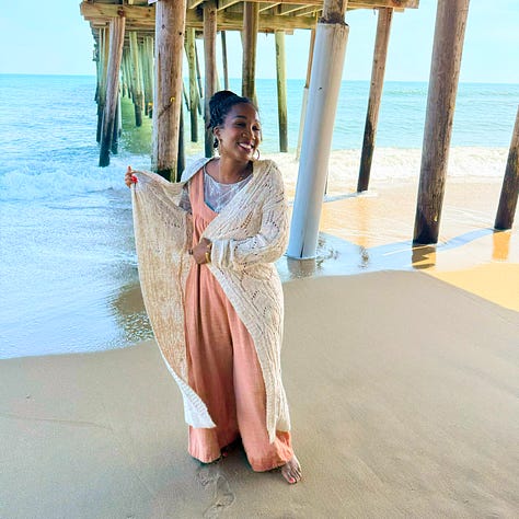Shaunda Necole with her family under the Virginia Beach pier during a family cookbook photoshoot, capturing generational connection, heritage, and the heart of The Soul Food Pot®