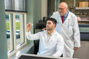 A TTUHSC research team published new evidence suggesting that the blood-brain barrier (BBB) remains largely intact in a commonly used mouse model of Alzheimer’s disease. Ehsan Nozohouri (seated), a TTUHSC graduate research assistant, was lead author; Ulrich Bickel, M.D., was principal investigator and senior author.