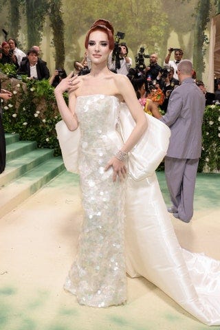 Image may contain Alexandra Lapp Clothing Dress Formal Wear Fashion Gown Wedding Wedding Gown Person and Adult
