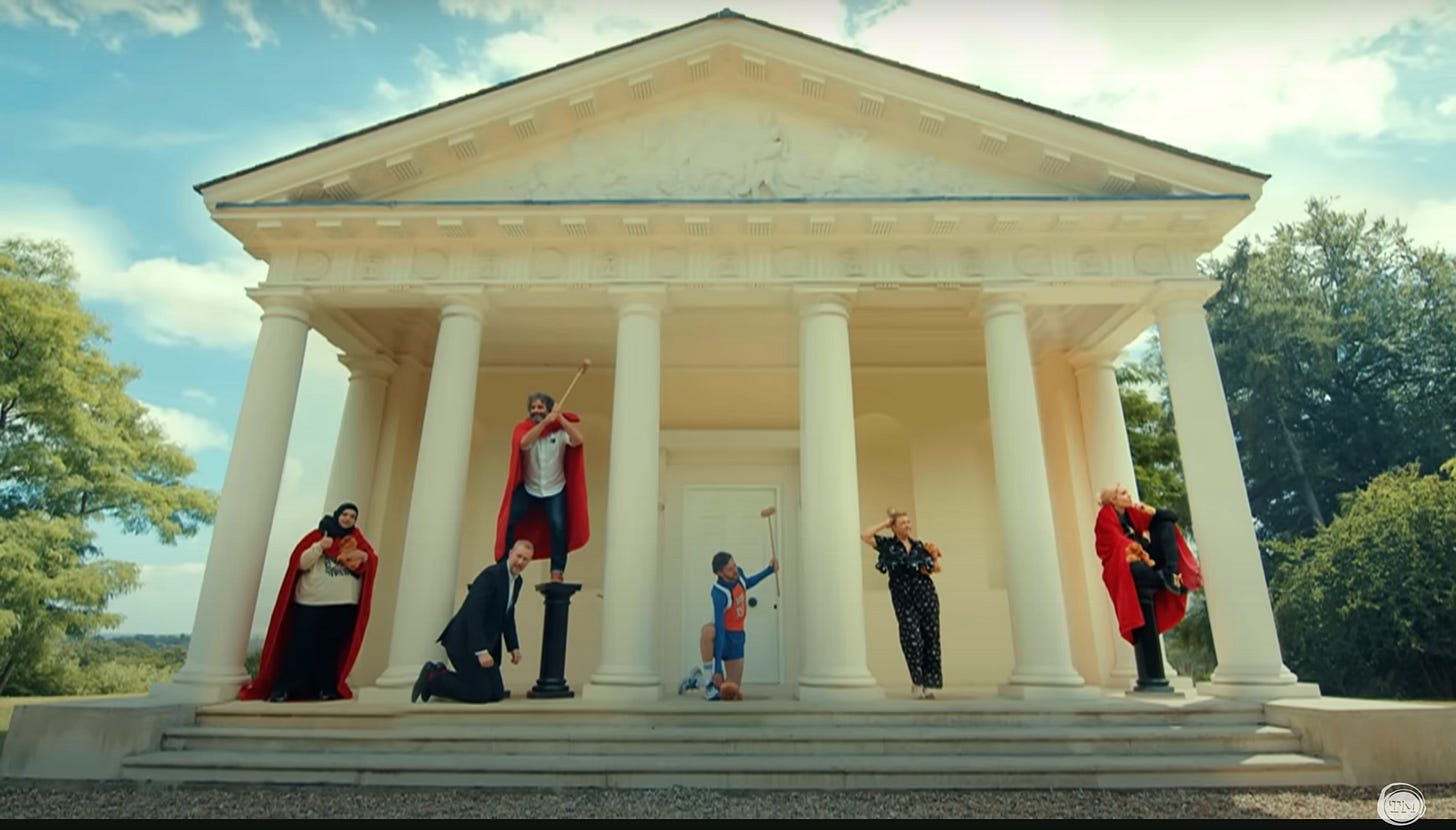 All five contestants stand in their powerful poses.