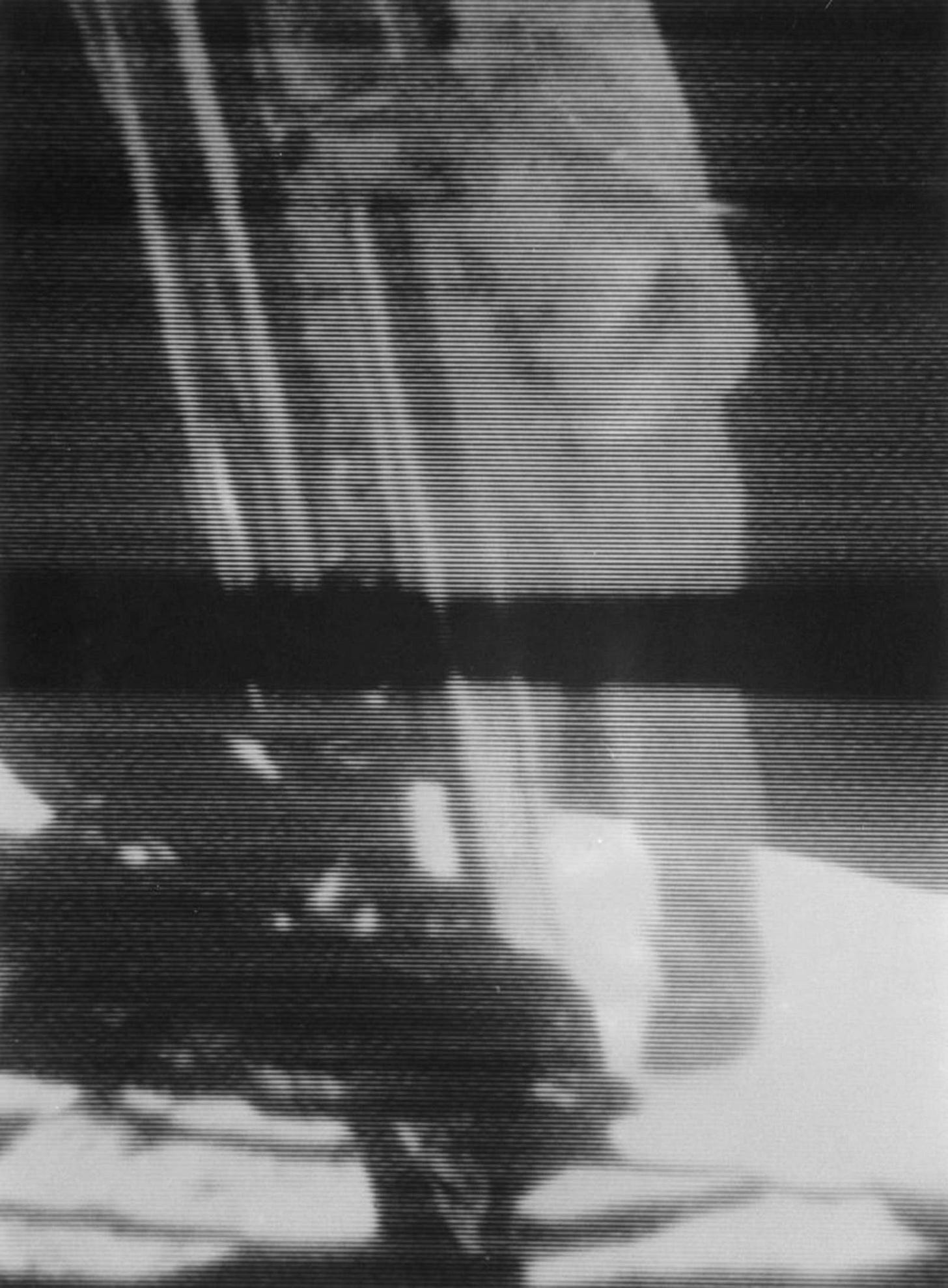 Commander Neil Armstrong climbing down the ladder of the Lunar Module (LM)
