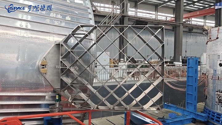 One of Hyperbola-3's grid fins (left) and the aft end of its second-stage (right).