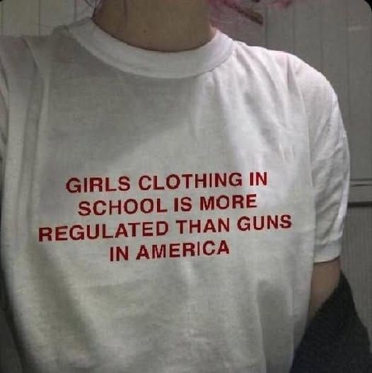 May be an image of 1 person and text that says 'GIRLS CLOTHING IN SCHOOL IS MORE REGULATED THAN GUNS IN AMERICA'
