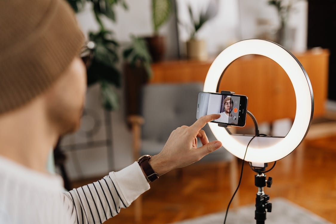 Free Selective Focus Photo of a Man Doing a Vlog Stock Photo