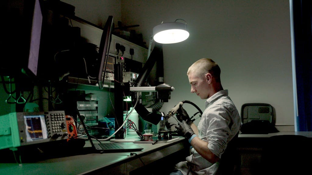 A team member at Fire1 in Dublin working on one of its medical devices