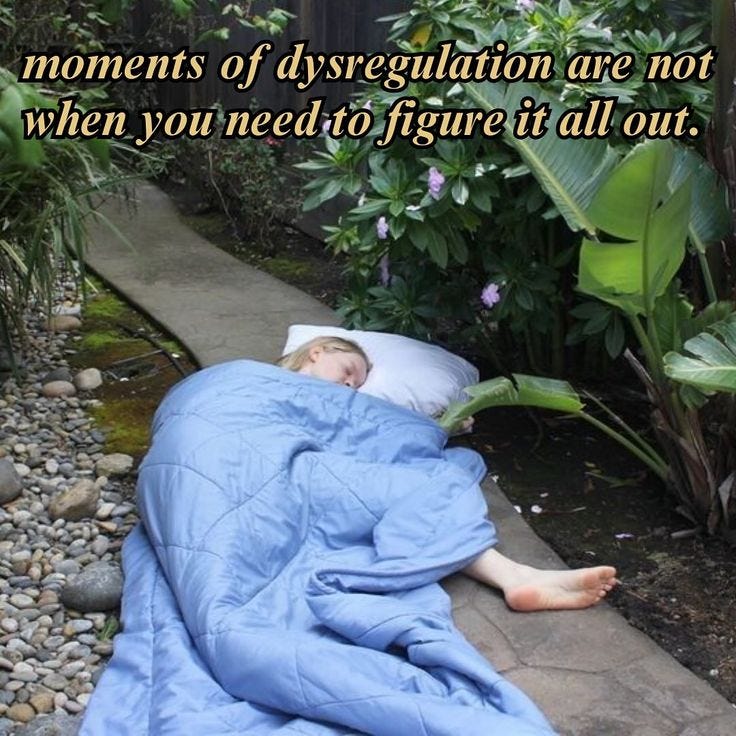 This may contain: a woman laying in bed under a blue blanket with the caption, there are moments of dysregululation are not when you need to figure it all out