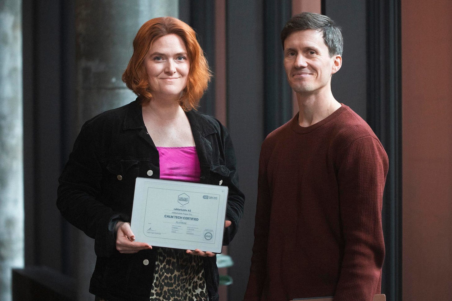 Amber Case, founder of the Calm Tech Institute, and Jon Dalvang, VP of Product Design at reMarkable, celebrate reMarkable’s Calm Tech Certification