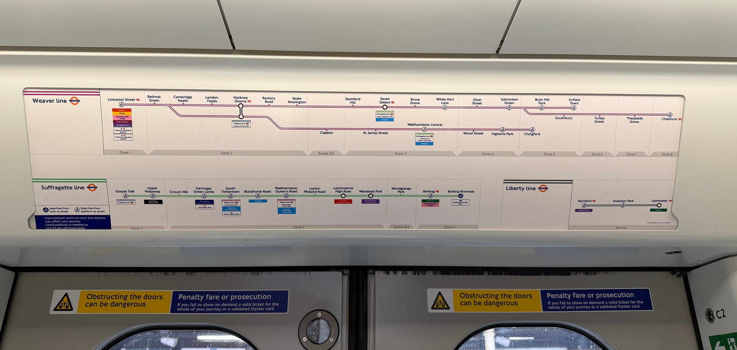 Photo of line diagrams for Weaver, Suffragette and Liberty lines on a Class 710 train.