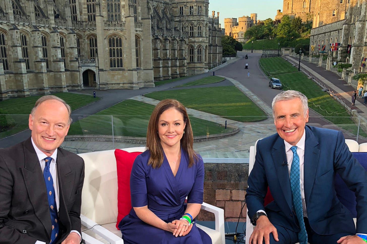HELLO! Royal Editor Emily Nash sitting in between Alastair Bruce and Dermot Murnaghan with Windsor Castle in the background