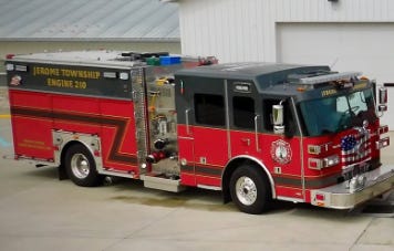 A fire truck parked in front of a building

AI-generated content may be incorrect.