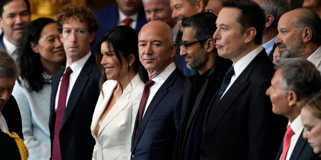 Guests including Mark Zuckerberg, Jeff Bezos, Sundar Pichai and Elon Musk, arrive before the 60th Presidential Inauguration in the Rotunda of the U.S. Capitol in Washington, Monday, Jan. 20, 2025. (AP Photo/Julia Demaree Nikhinson, Pool) Guests including Mark Zuckerberg, Jeff Bezos, Sundar Pichai and Elon Musk, arrive before the 60th Presidential Inauguration in the Rotunda of the U.S. Capitol in Washington, Monday, Jan. 20, 2025. (AP Photo/Julia Demaree Nikhinson, Pool)