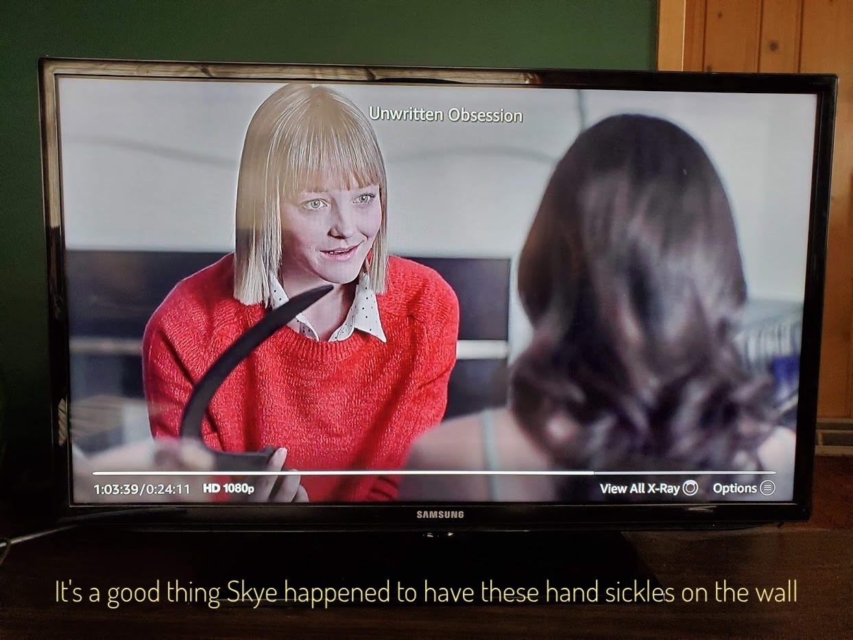 Holly holding a curved hand sickle and smiling slightly while talking to Skye, captioned "It's a good thing Skye happened to have these hand sickles on the wall"
