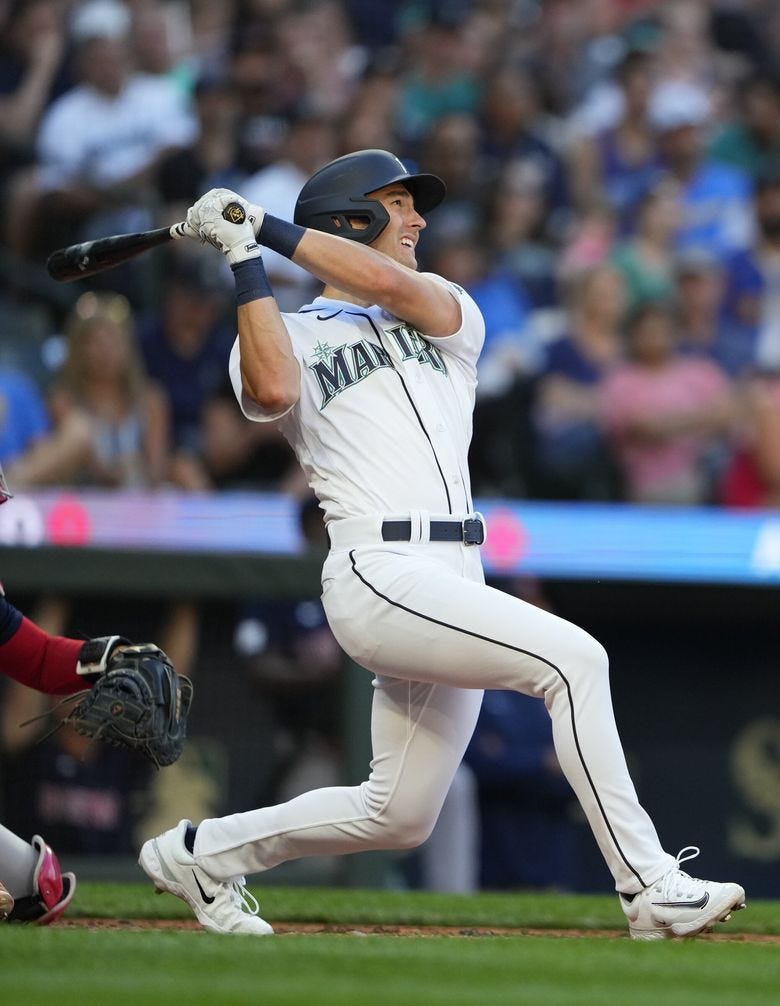 Seattle Mariners&#8217; Dominic Canzone follows through during an at-bat in a baseball game against the Boston Red Sox earlier this month in Seattle. (Lindsey Wasson / The Associated Press)