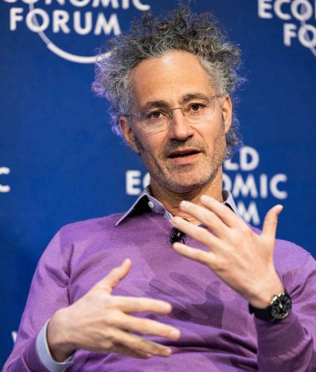 A person in a purple shirt

AI-generated content may be incorrect.