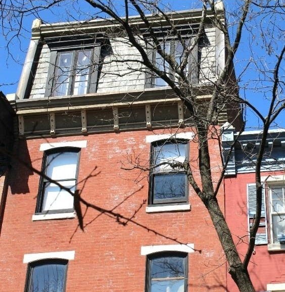 A building with a tree in the background
Description automatically generated A building with a tree in the background
Description automatically generated