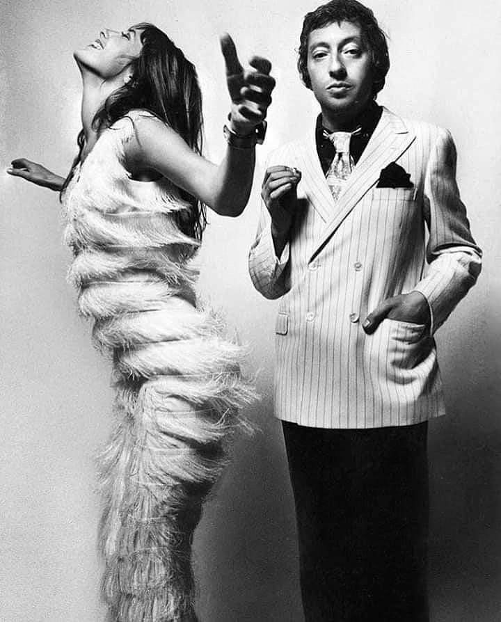 This may contain: the man and woman are dressed in costumes This may contain: the man and woman are dressed in costumes