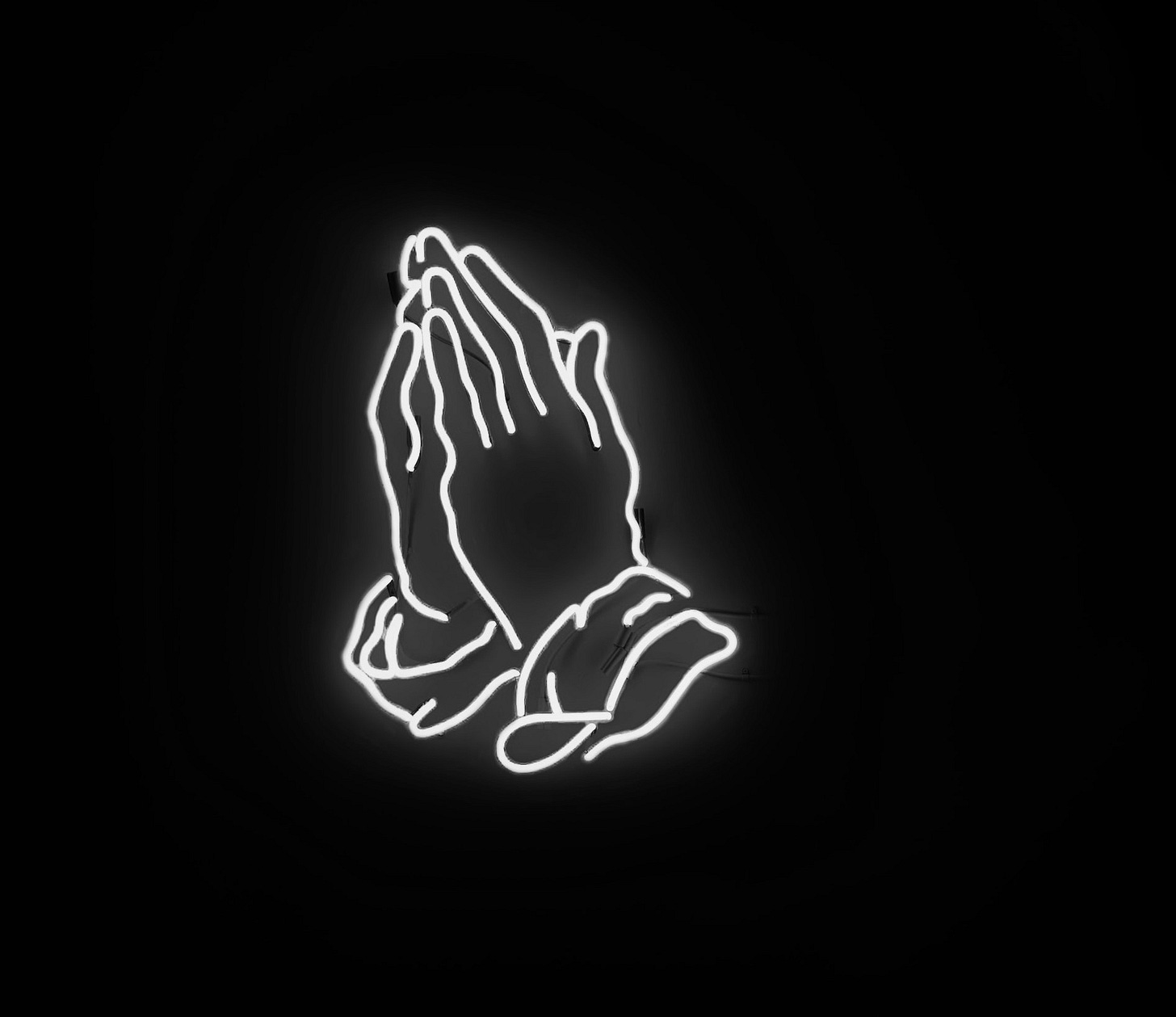 Neon sign depicting praying hands