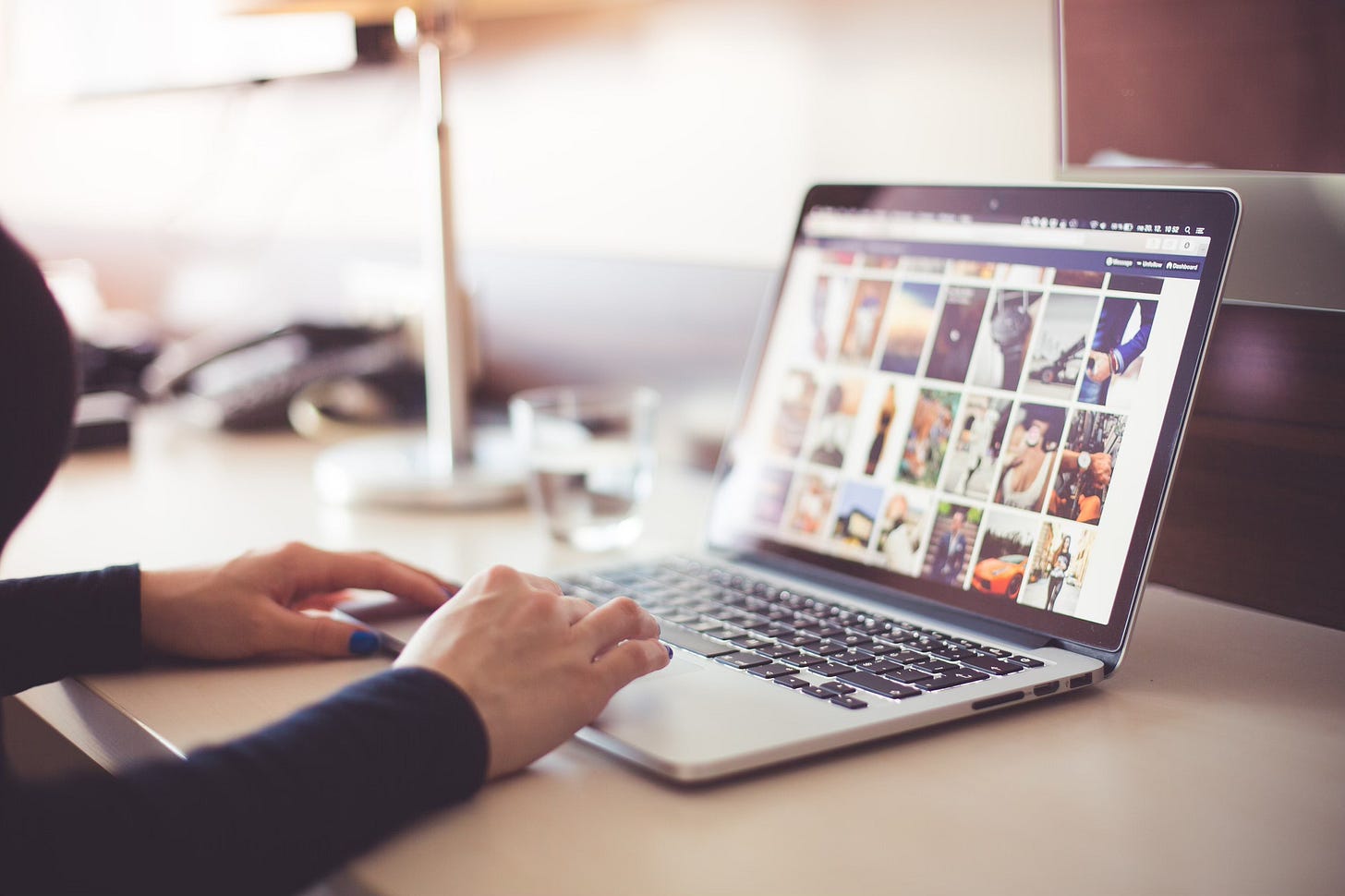 A person uses a laptop