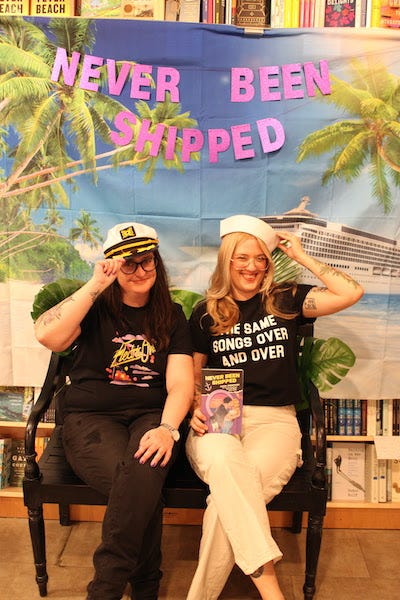 left: me and Rachel Knox sitting on a bench in front of a cruise backdrop doing a jaunty pose with our sailor hats and holding up the book