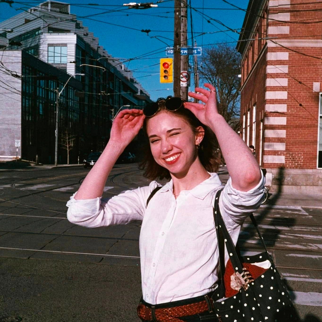 Gabrielle can't keep her eyes open in the sunshine. We'll call it a wink.
