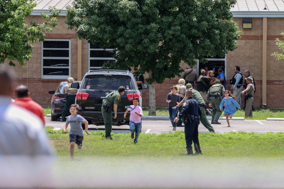 Students flee after a gunman entered Robb Elementary School in Uvalde on May 24, 2022. Students flee after a gunman entered Robb Elementary School in Uvalde on May 24, 2022.