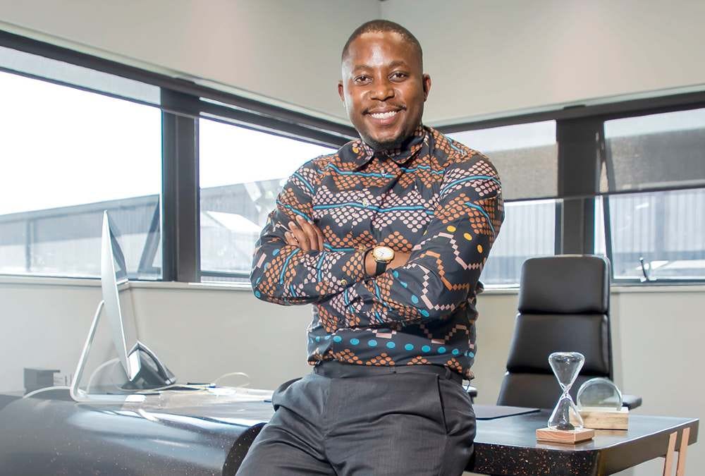 Theo Baloyi, founder of Bathu, in a professional office setting