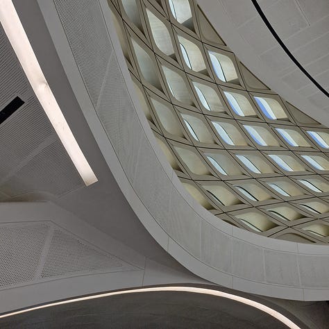 Views of the Riyadh Metro. From left to right, the entrance for single men on the Airport T3–4 station of Line 4; the architecture of the KAFD Station designed by Zaha Hadid Architects; the escalator at station King Fahad District 2 of Line 1.